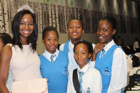 Some of the adolescent girls with 2016 Miss Botswana 1st Princess, Bonnie Kamona