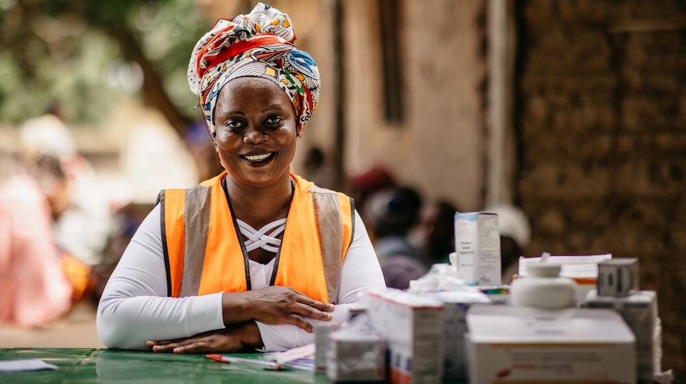 Pharmacist Cristina administers medication at a mobile brigade in Cabo Delgado, Mozambique.